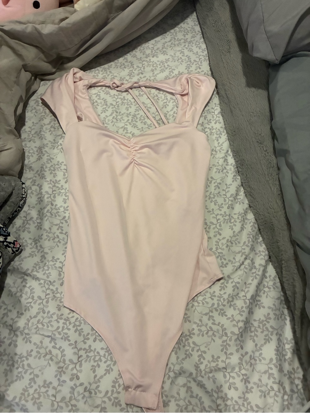 Pink bodysuit